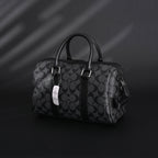 Coach Signature Duffel Bag – Black Monogram Canvas with Leather Trim